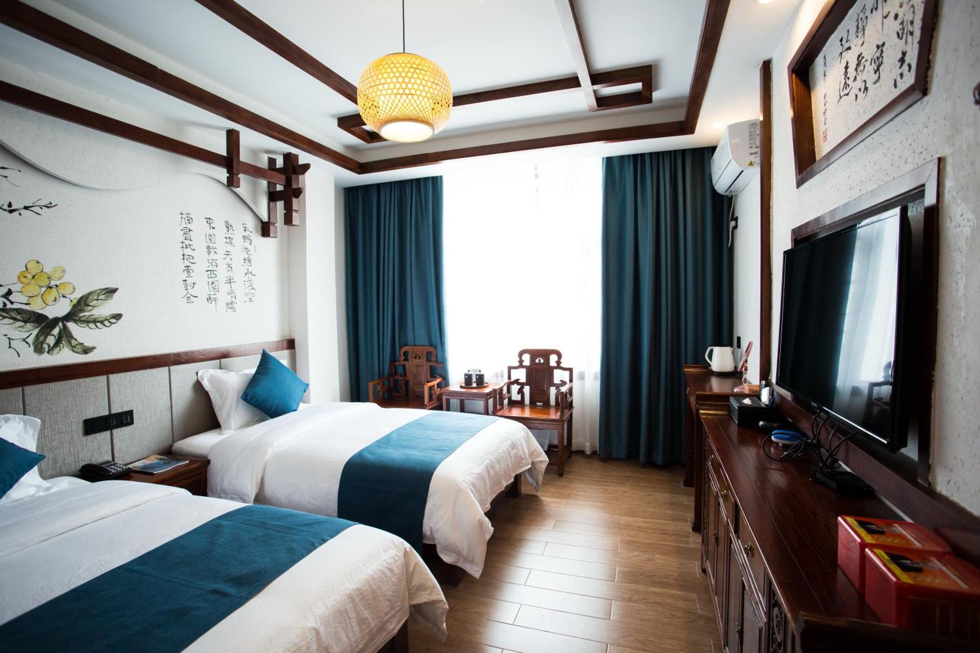 一树一花客栈眷恋店 Apartment Wulingyuan Bagian luar foto